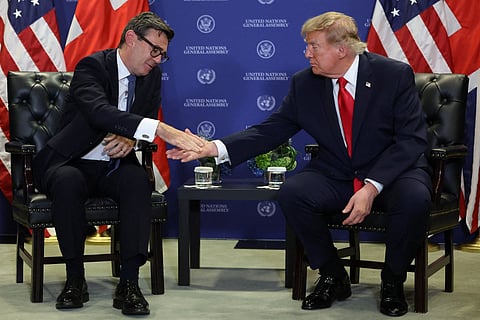 Britain's Prime Minister Andy Burnham shakes hands with US President Donald Trump during a meeting on the sidelines of the 81st United Nations General Assembly on September 22, 2026 in New York City.