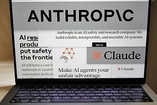 FILE - Pages from the Anthropic website and the company's logos are displayed on a computer screen in New York, Feb. 26, 2026. (AP Photo/Patrick Sison, File)