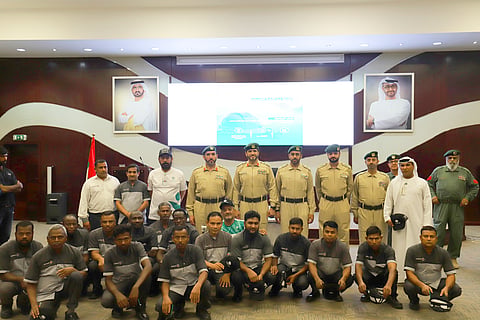 Dubai Police provides 120 workers with heat-safety advice and hydration supplies.
