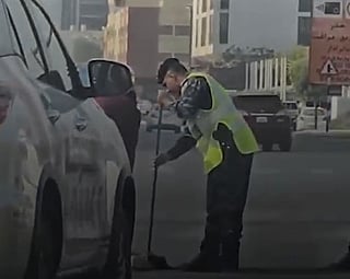 UAE police officer goes viral for clearing crash debris