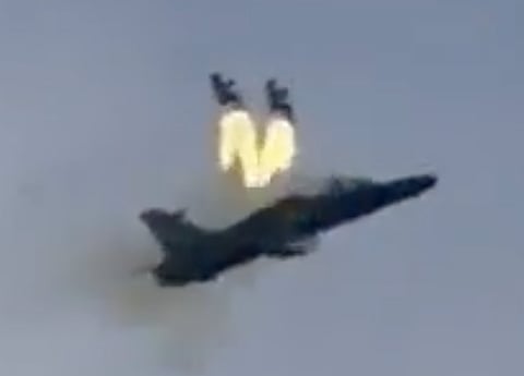 A Royal Navy Hawk T1 jet has crashed during a training exercise in Wales. Two pilots ejected moments before the aircraft crashed in flames.