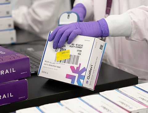 This undated photo provided by Grail Inc. on Tuesday, Sept. 22, 2026, shows an employee scanning a Galleri cancer screening test.