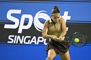 Russia's Tatiana Prozorova hits a return against Philippines' Alexandra Eala during the WTA Singapore Open Tennis round of 16 in Singapore on September 24, 2026.