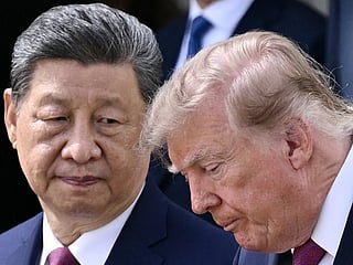 China's President Xi Jinping and US President Donald Trump during a military review in the Rose Garden of the White House in Washington, DC, on September 24, 2026. 