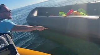 A video appears to show anti-migrant activist Daniel Thomas slashing at an inflatable boat with a knife in the English Channel. The boat had been carrying about 50 migrants who had launched from a beach in Normandy, France. They were picked up by two RNLI lifeboats once they had reached the UK search and rescue area. They were then transferred to a UK Border Force vessel and taken to Dover for processing.