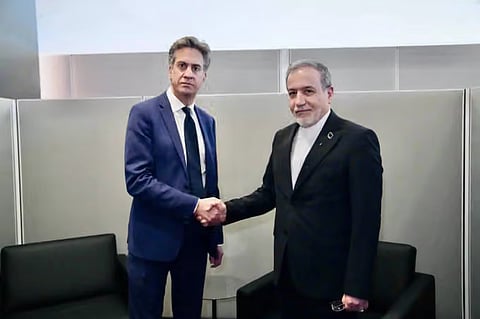 British Foreign Secretary Ed Miliband (L) shakes hands with Iranian Foreign Minister Abbas Araghchi during their meeting in New York, September 24, 2026.