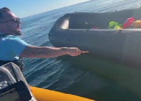 A video appears to show anti-migrant activist Daniel Thomas slashing at an inflatable boat with a knife in the English Channel. The boat had been carrying about 50 migrants who had launched from a beach in Normandy, France. They were picked up by two RNLI lifeboats once they had reached the UK search and rescue area. They were then transferred to a UK Border Force vessel and taken to Dover for processing.