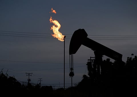 Oil briefly eased as Iran and the United States reopened a diplomatic channel on the sidelines of the UN General Assembly.