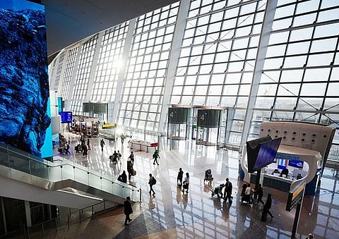 Passengers at Dubai International Airport as UAE airlines monitor flight operations amid continued regional disruption.