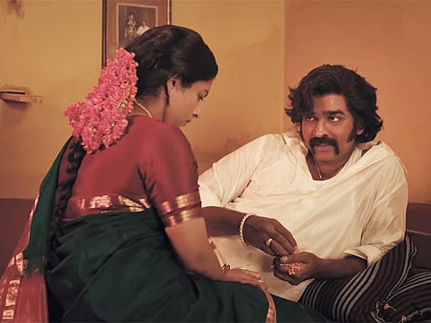 Vijay Sethupathi and Lijomol Jose in Baththa.