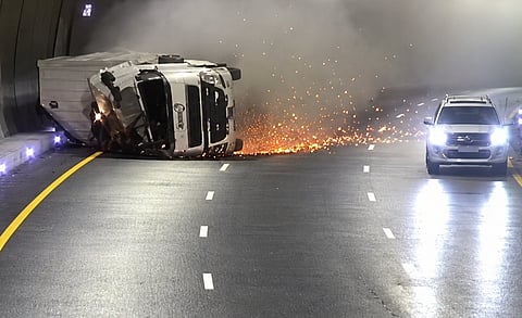 Footage of the serious accident shows the truck entering the tunnel before overturning onto its left side near a bend in the road. 
