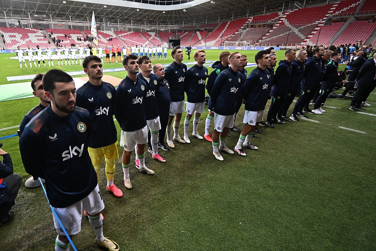 Members of the Republic of Ireland team listen to their national anthem at Nagyerdei Stadium in Debrecen ahead of the UEFA Nations League football match between Israel and the Republic of Ireland in Debrecen, Hungary, on September 27, 2026.