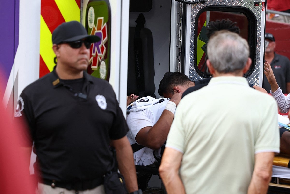 Quarterback Dante Moore of the Oregon Ducks is put in an ambulance in the first half of a game against the USC Trojans at Los Angeles Memorial Coliseum on September 26, 2026 in Los Angeles, California.