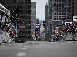 The United States' Brandon McNulty celebrates winning the Men Elite Road Race during the 2026 Union Cycliste Internationale (UCI) Road World Championships in Montreal, Quebec, on September 27, 2026.