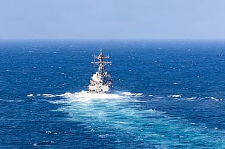 USS Rafael Peralta (DDG 115) sails in regional waters as the guided-missile destroyer continues strict enforcement of the US blockade against Iran.