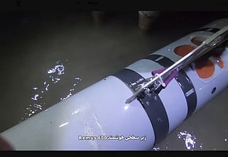 The English translation from Persian of an IRGC post on X states: "The Strait of Hormuz is not only open, but a hunting ground for the IRGC Navy targeting American submarines; the second catch has been reeled in, this time the Mk 18 Mod 2 Kingfish; an advanced, autonomous AUV equipped with sonar and precision navigation, worth several million dollars. It's not just a hunt; it's a trophy of technology and intelligence."