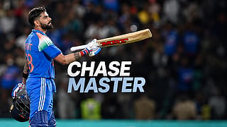 India's Virat Kohli celebrates after scoring a century (100 runs) during the first one-day international (ODI) cricket match between India and West Indies at the Greenfield International Stadium in Thiruvananthapuram on September 27, 2026.