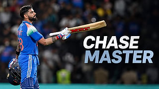 India's Virat Kohli celebrates after scoring a century (100 runs) during the first one-day international (ODI) cricket match between India and West Indies at the Greenfield International Stadium in Thiruvananthapuram on September 27, 2026.