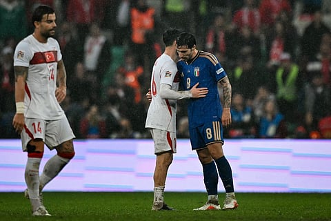 Turkey's midfielder #06 Orkun Kokcu (L) and Italy's midfielder #08 Sandro Tonali react at the end of the UEFA Nations League football match (League A, Group A1) between Turkey and Italy at the Ataturk Sports Complex Matlı Stadium in Bursa on September 28, 2026.