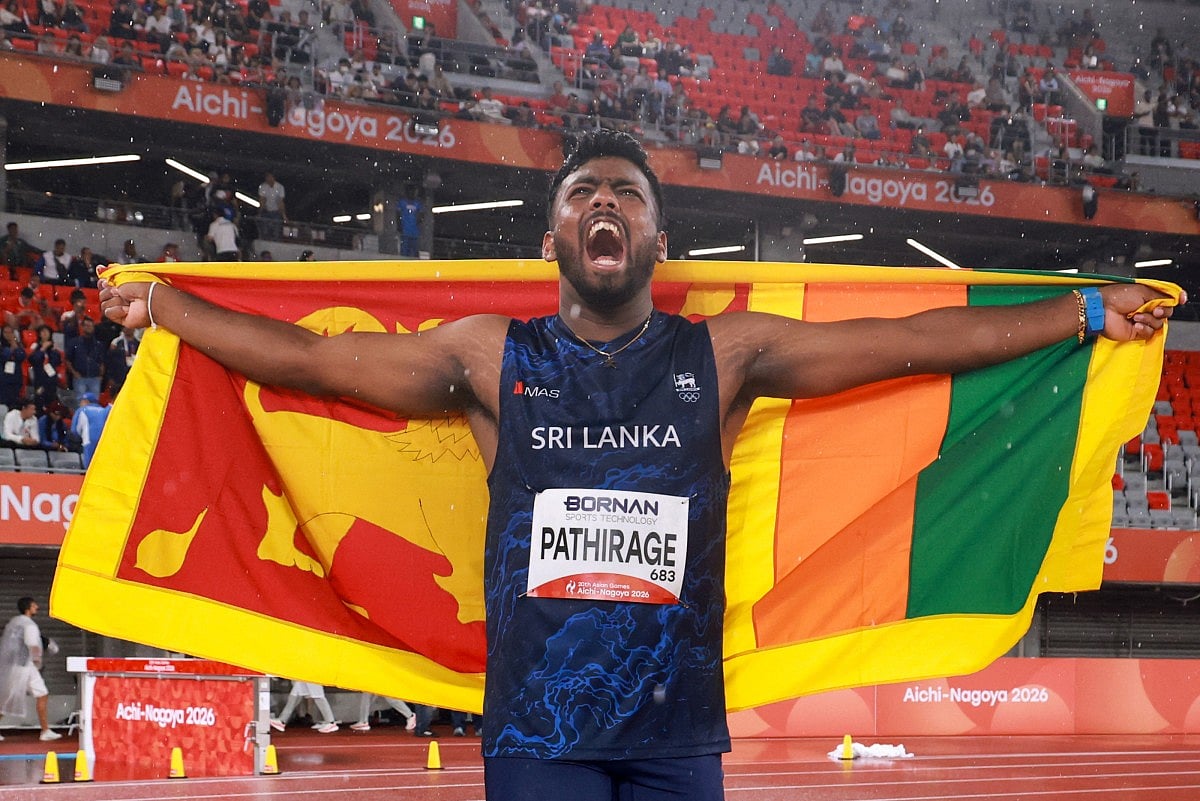 Sri Lanka's Rumesh Pathirage celebrates after winning the men's javelin throw final during the 2026 Asian Games at Nagoya City Mizuho Park Athletic Stadium in Nagoya, Aichi Prefecture on September 28, 2026.