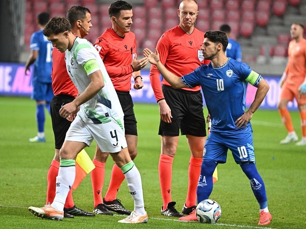 Republic of Ireland captain Dara O'Shea (L) turns away from Israel captain Manor Solomon (R) during the pre-match protocol before the UEFA Nations League Group B3 football match between Israel and the Republic of Ireland at Nagyerdei Stadium in Debrecen, Hungary, on September 27, 2026.