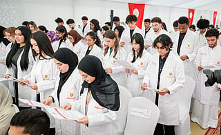 The white coat ceremony ran across morning and midday sessions at Thumbay grounds in Ajman on September 23