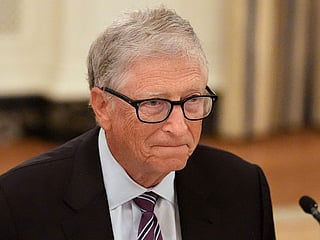 FILE - Microsoft's Bill Gates attends a dinner with President Donald Trump in the State Dining Room of the White House, Sept. 4, 2025, in Washington. (AP Photo/Alex Brandon, File)