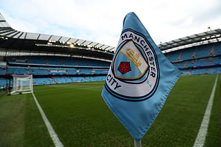 The club logo decorates a corner flag before the English Premier League soccer match between Manchester City and Newcastle United at the Etihad Stadium in Manchester, England, Saturday, Sept. 1, 2018.  