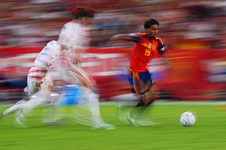 In this photo taken with slow shutter speed Spain's Lamine Yamal is in action during the Nations League soccer match between Spain and Croatia in Seville, Spain, Tuesday, Sept. 29, 2026.