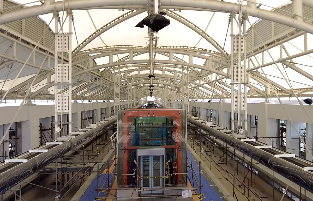 An elevator that brings passengers to the train platform being installed at a station of the North-South Commuter Railway, a 147-km electrified train that will connect New Clark City in Pampanga, Metro Manila (16 cities and one municipality) and Calamba, in Laguna, Philippines.