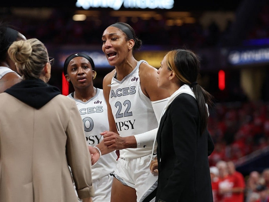 A'ja Wilson #22 of the Las Vegas Aces is visibly upset after entering the stands to confront a fan during game two of the first round of the WNBA Playoffs against the Indiana Fever at Gainbridge Fieldhouse on September 29, 2026 in Indianapolis, Indiana.