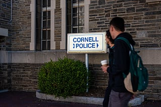 Students walk past Cornell Police headquarters on the Cornell University campus on September 30, 2026, in Ithaca, New York.