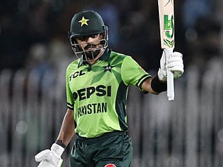 Pakistan's Babar Azam celebrates after scoring half century (50 runs) during the first one-day international (ODI) cricket match between Pakistan and Australia at the Rawalpindi Cricket Stadium in Rawalpindi on May 30, 2026.
