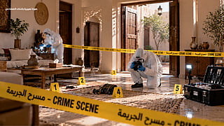 Dubai Police forensic experts document crime scenes using advanced tools.