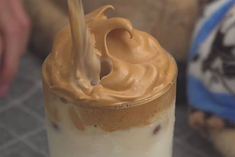 Froth coffee.
