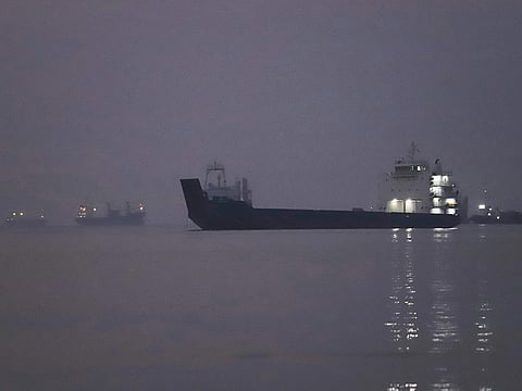 Cargo ships are anchored in the Strait of Hormuz off Bandar Abbas, Iran, before sunrise on Monday, Sept. 28, 2026. 