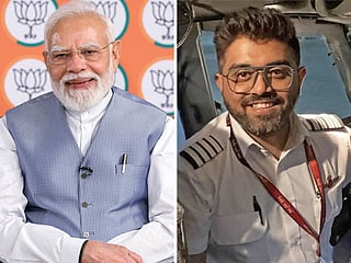 Indian Prime Minister Narendra Modi and flydubai pilot Smit Machchhar. Machchhar was praised by Modi for his courage after he was stabbed by the co-pilot during a flight from Dubai to Tel Aviv.