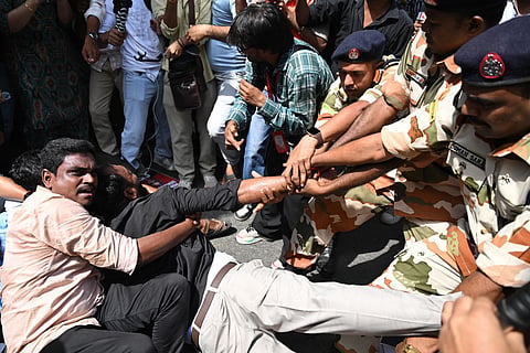 Members of the Communist Party of India's student wing are detained by police during a protest against India's Chief Election Commissioner Gyanesh Kumar, condemning alleged electoral malpractices in the Special Intensive Revision (SIR) of electoral rolls, in New Delhi on October 2, 2026.