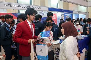 Students from UAE schools interacting with exhibitors 
