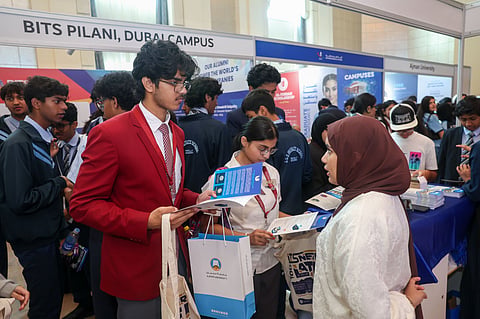 Students from UAE schools interacting with exhibitors 