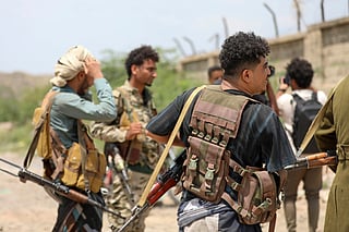 Saudi-backed Yemen government soldiers gather near the Jabal Han front, west of the city of Taiz, following fierce battles earlier in the day as Yemen's Houthis reportedly attempted to seize control of the main route between the inland city of Taiz and the coastal city of Aden, on October 3, 2026.