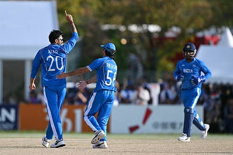 India players celebrate the dismissal of Pakistan's Maaz Sadaqat during the men's cricket final match between Pakistan and India during the 2026 Asian Games at the Korogi Athletic Park in Nisshin on October 3, 2026.
