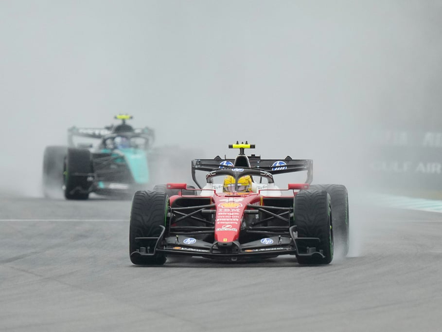 Ferrari driver Lewis Hamilton of Britain steers his car during the formation lap prior to the delayed start of the Bahrain Grand Prix in Sepang, Malaysia, Sunday, Oct. 4, 2026.