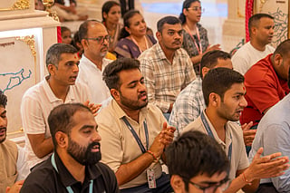 Devotees and priests prayed for the injured pilot's swift and complete recovery