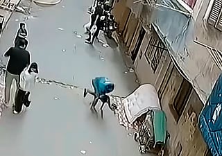 Video of the incident shows Ragab rushing towards the falling child and catching him in his arms just before he could hit the ground.