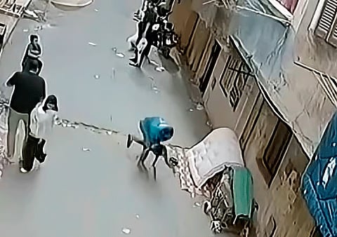 Video of the incident shows Ragab rushing towards the falling child and catching him in his arms just before he could hit the ground.