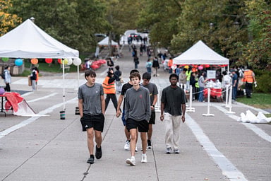 Students walking through campus at Cornell University in Ithaca, New York.  