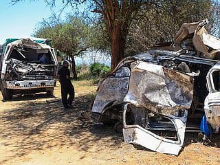 A man views the wreckage of a 14-seater minibus that was involved in an accident killing all the passengers, in the Salama area, Makueni County, Eastern Kenya, Saturday, October 3, 2026. 