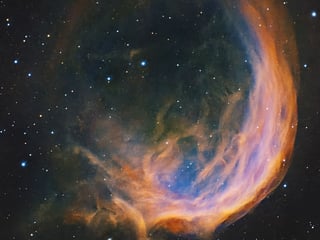 The nebula lies about 2,770 light-years from Earth in the constellation Cassiopeia. 