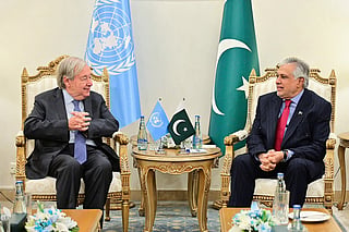 This handout photograph taken on October 6, 2026 and released by Pakistan’s Ministry of Foreign Affairs shows Pakistan's Foreign Minister Ishaq Dar (R) speaking with United Nations Secretary General Antonio Guterres during their meeting at the Ministry of Foreign Affairs in Islamabad.